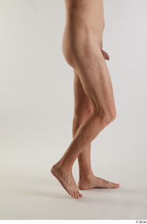 Arvid  1 calf flexing nude side view 0002.jpg